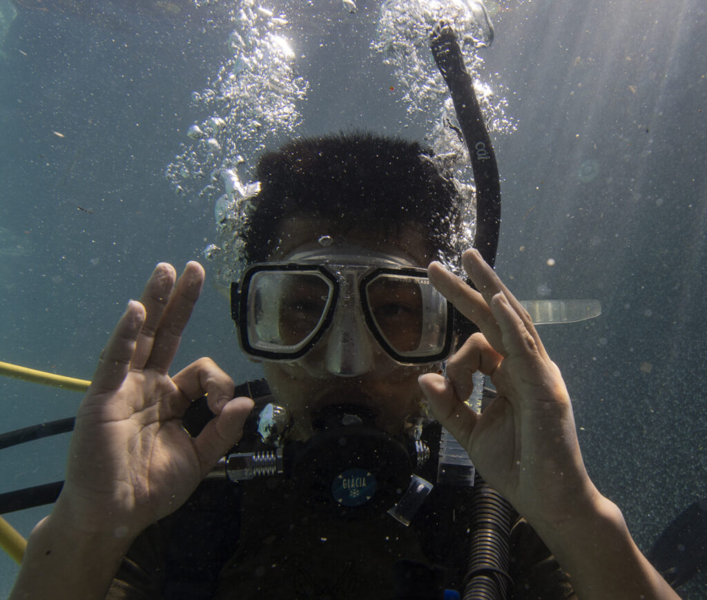 student scuba diving