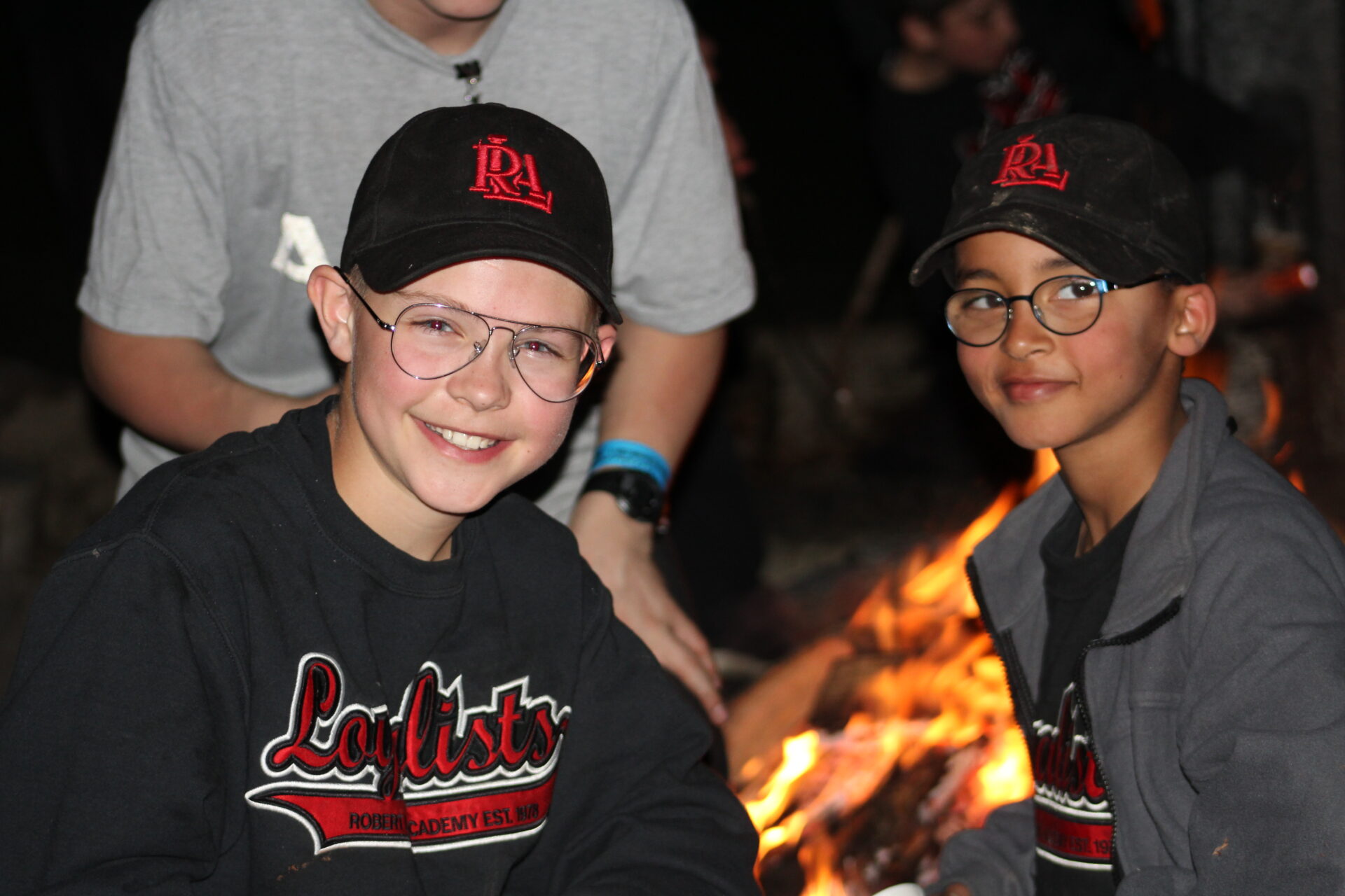 Students siting by the campfire