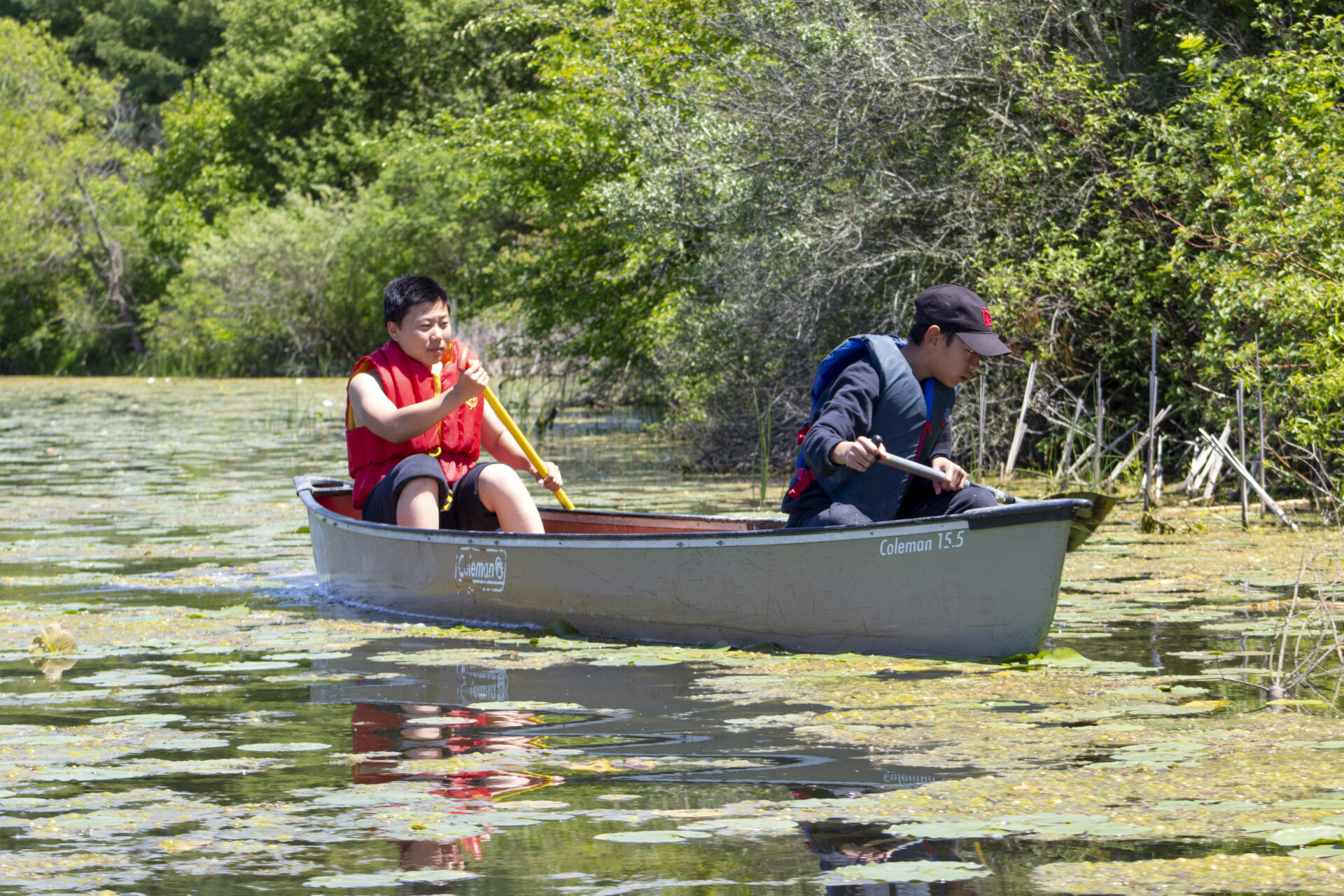 Students paddling in their canoe